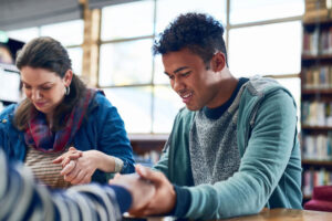 Students praying together for success