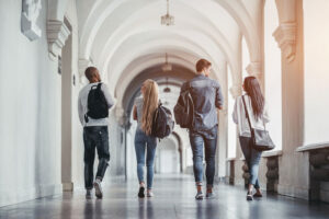 Students walking campus walkway