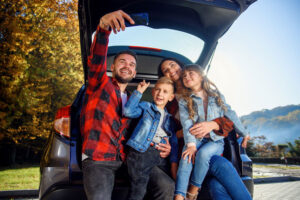 Family selfie on road trip 