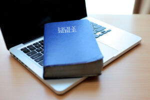 Holy bible and laptop