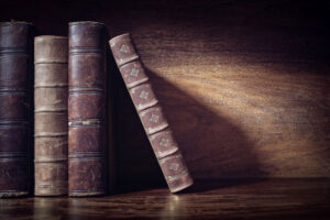 Old books on library shelf