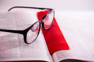Bible, bookmark, and glasses