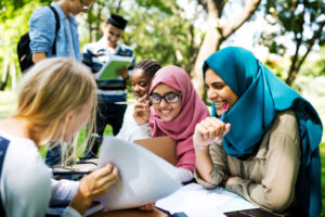 Religious studies group studying outside