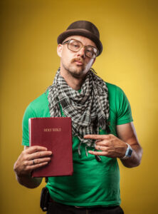 Christian hipster holding Bible