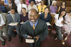 priest with congregation elders