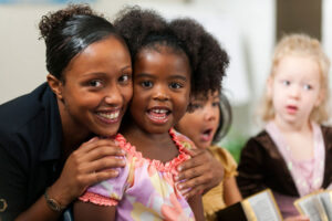 Sunday school teacher with kids