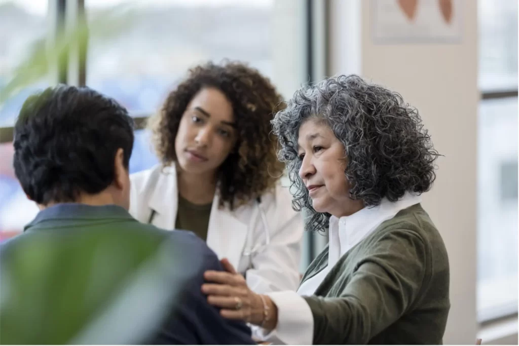 A Christian leader offering comfort and empathy to her fellow church member. Emotional intelligence is vital in Christian leadership for nurturing personal growth and supporting the congregation.